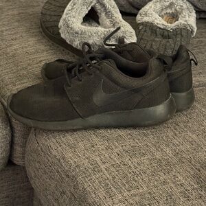 Nike All-Black Athletic Shoes